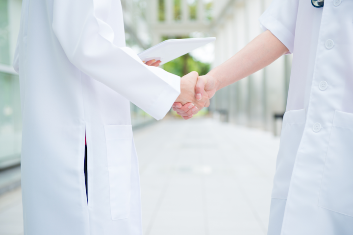 Doctors Shake Hands