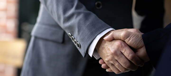 Copyright Vichaya Kiatyingangsulee Dreamstime Men Shaking Hands