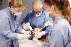 Figure 1: Six-handed dentistry is a definite way to increase practice productivity. Some dentists use six-handed dentistry on most procedures, while others use it only on more demanding procedures. Figure 1: Six-handed dentistry is a definite way to increase practice productivity. Some dentists use six-handed dentistry on most procedures, while others use it only on more demanding procedures.