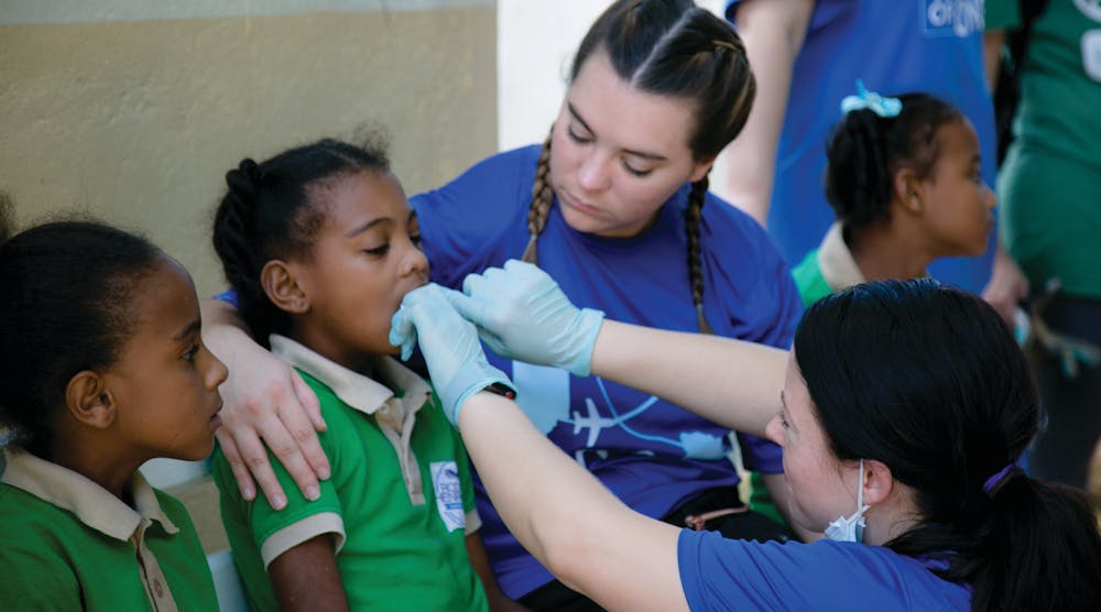 A member of Dr. Steven M. Pilpovich&apos;s team provides oral care at Good Samaritan Hospital. Dr. Pilpovich was among a group of US dentists who recently aided in the revitalization of the hospital&apos;s dental outreach program.