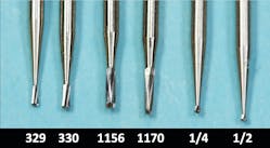 Figure 2: The round-ended, noncrosshatched burs shown here are the recommended burs of today. These burs are far less abusive than the types shown in Figure 1.