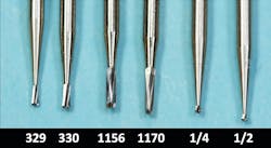 Figure 2: The round-ended, noncrosshatched burs shown here are the recommended burs of today. These burs are far less abusive than the types shown in Figure 1. Figure 2: The round-ended, noncrosshatched burs shown here are the recommended burs of today. These burs are far less abusive than the types shown in Figure 1.