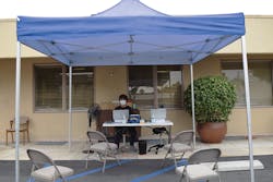 The welcoming face of a beloved former hygienist greets patients as they arrive for their appointments. COVID-19 wellness checks offer patients reassurance prior to entrance. The welcoming face of a beloved former hygienist greets patients as they arrive for their appointments. COVID-19 wellness checks offer patients reassurance prior to entrance.