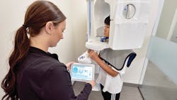 Planmeca's ProMax in use prior to the COVID-19 pandemic Planmeca's ProMax in use prior to the COVID-19 pandemic