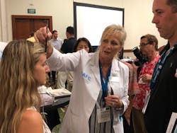 Figure 3: AAFE faculty member Dr. Vesna Sutter teaches Botox to attendees at a past ADA annual meeting. Figure 3: AAFE faculty member Dr. Vesna Sutter teaches Botox to attendees at a past ADA annual meeting.