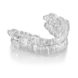 Figure 5: Precision milled monolithic ProSomnus EVO appliance ready for patient use. Figure 5: Precision milled monolithic ProSomnus EVO appliance ready for patient use.