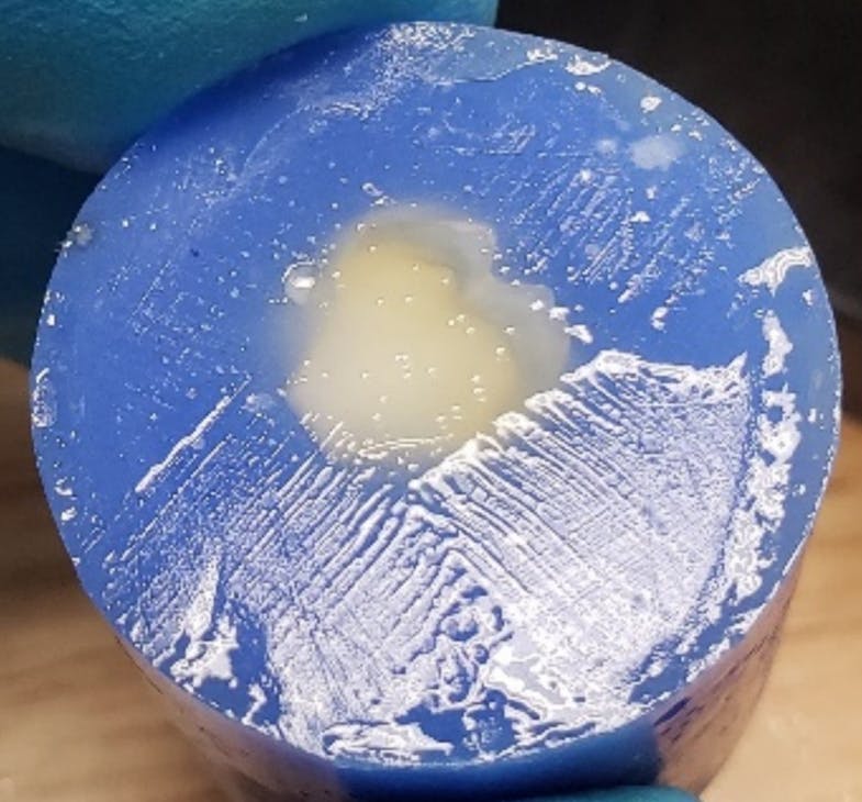 Figure 5: Water droplet contamination from an air-water syringe results in lower bond strengths. Figure 5: Water droplet contamination from an air-water syringe results in lower bond strengths.