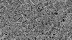 Scanning electron microscope image of lithium disilicate (IPS e.max) that has been polished and etched with hydrofluoric acid for 20 seconds. Scanning electron microscope image of lithium disilicate (IPS e.max) that has been polished and etched with hydrofluoric acid for 20 seconds.
