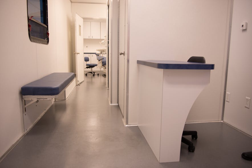 Temp office reception area. Patient intake and waiting area allows for officelike feel in mobile clinics.
