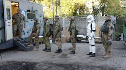 A queue of soldiers (one even sporting a Star Wars costume) for mobile dental clinic Tryzub Dental. A queue of soldiers (one even sporting a Star Wars costume) for mobile dental clinic Tryzub Dental.