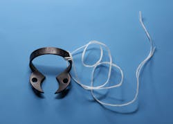 Figure 17: Ligated clamp depicting just the bow secured with floss Figure 17: Ligated clamp depicting just the bow secured with floss