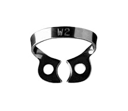 Figure 9: W2 clamp showing flat jaws, prongs, and bow. The wingless design is easy to position on the tooth comfortably and securely before rubber dam placement. Figure 9: W2 clamp showing flat jaws, prongs, and bow. The wingless design is easy to position on the tooth comfortably and securely before rubber dam placement.