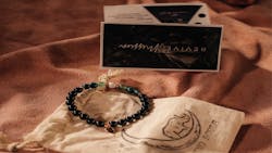 Figure 1: Revive Mission bracelet given to guests at dental aid yoga retreats Figure 1: Revive Mission bracelet given to guests at dental aid yoga retreats