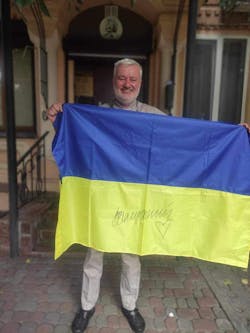 Dr. Horbenko with his award, a flag signed by Commander-in-Chief of the Armed Forces of Ukraine General Valerii Zaluzhnyi. Dr. Horbenko with his award, a flag signed by Commander-in-Chief of the Armed Forces of Ukraine General Valerii Zaluzhnyi.