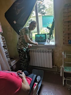 Dr. Drobotenko treats a civilian patient in the improvised dental clinic near the frontline in Luhansk region. Dr. Drobotenko treats a civilian patient in the improvised dental clinic near the frontline in Luhansk region.