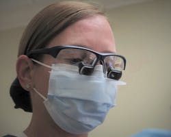 Figure 4: A surgical mask with a bottom gap deflector Figure 4: A surgical mask with a bottom gap deflector