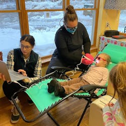 Mainely Teeth staff taking intraoral photos of a child’s teeth. Mainely Teeth staff taking intraoral photos of a child’s teeth.