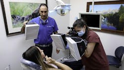 Figure 2: Photographs of a patient’s teeth are taken to document and highlight treatment progress and results. Figure 2: Photographs of a patient’s teeth are taken to document and highlight treatment progress and results.