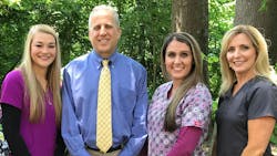 Dr. Robert Minch with his small staff, from left: Kyleigh, dental assistant; Dr Minch; Corinne, dental hygienist; and Tina, front desk manager. Dr. Robert Minch with his small staff, from left: Kyleigh, dental assistant; Dr Minch; Corinne, dental hygienist; and Tina, front desk manager.