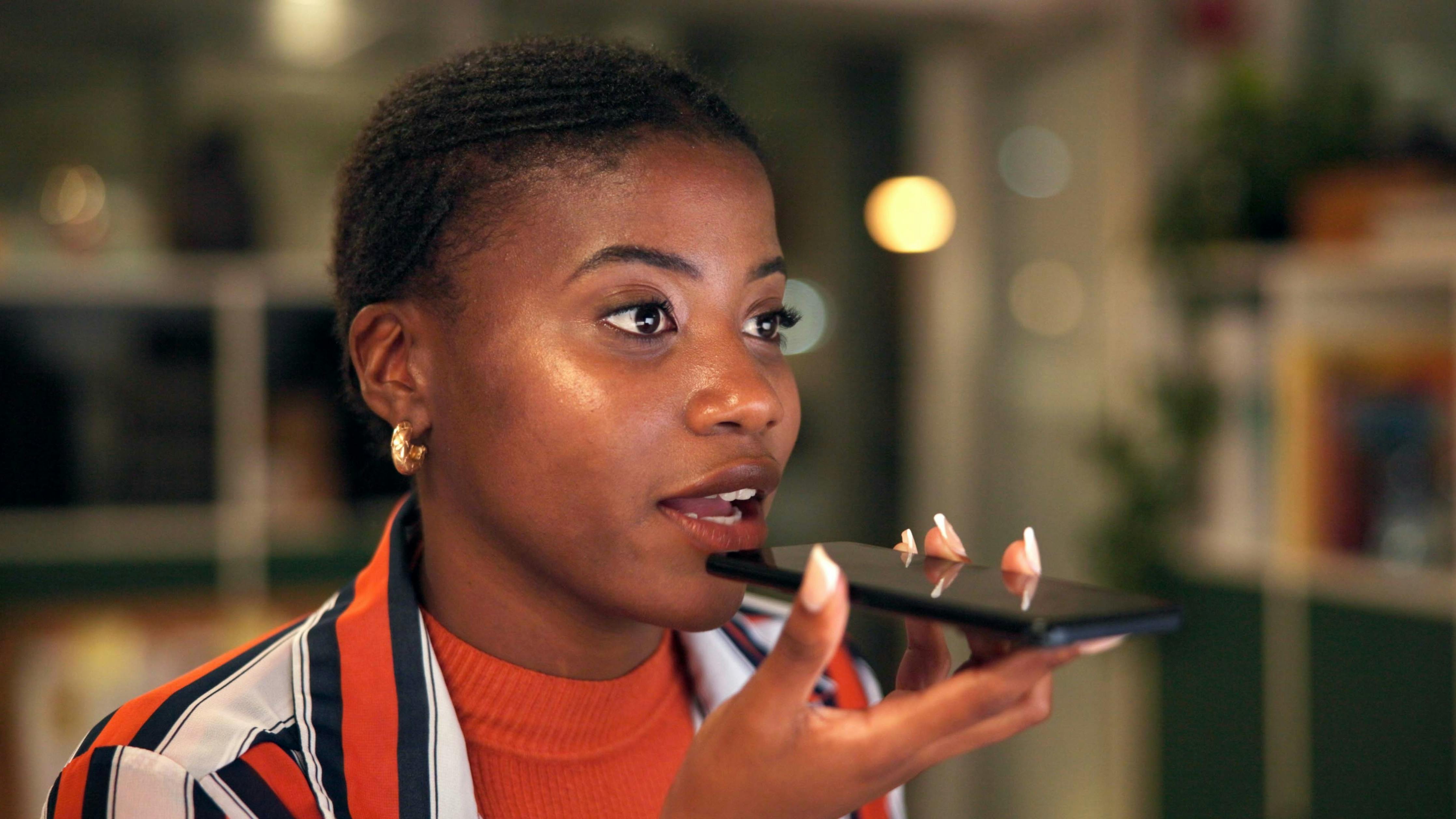 Young woman talking on smartphone
