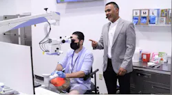 The author, Dr. Hugues, leading dental microscope training