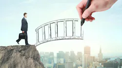 man about to step on a bridge that's being drawn