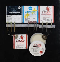 Figure 5: Dura-Green and ZilMaster stones; LitZir diamond impregnated rubber wheels in two shapes; LitZir Polishing Paste with Robinson brush. ShofuLab USA. Figure 5: Dura-Green and ZilMaster stones; LitZir diamond impregnated rubber wheels in two shapes; LitZir Polishing Paste with Robinson brush. ShofuLab USA.