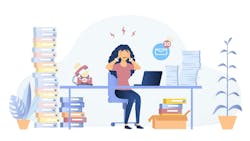 Frustrated woman sitting at desk with paperwork and full email inbox Frustrated woman sitting at desk with paperwork and full email inbox