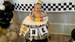 A baby celebrating his first birthday A baby celebrating his first birthday