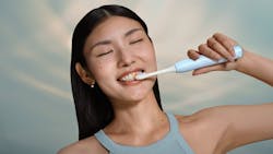 Woman brushing with Philips Sonicare Series 6300 Woman brushing with Philips Sonicare Series 6300