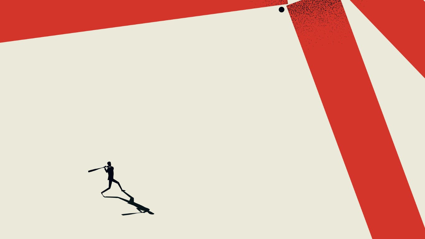 a person batting a ball