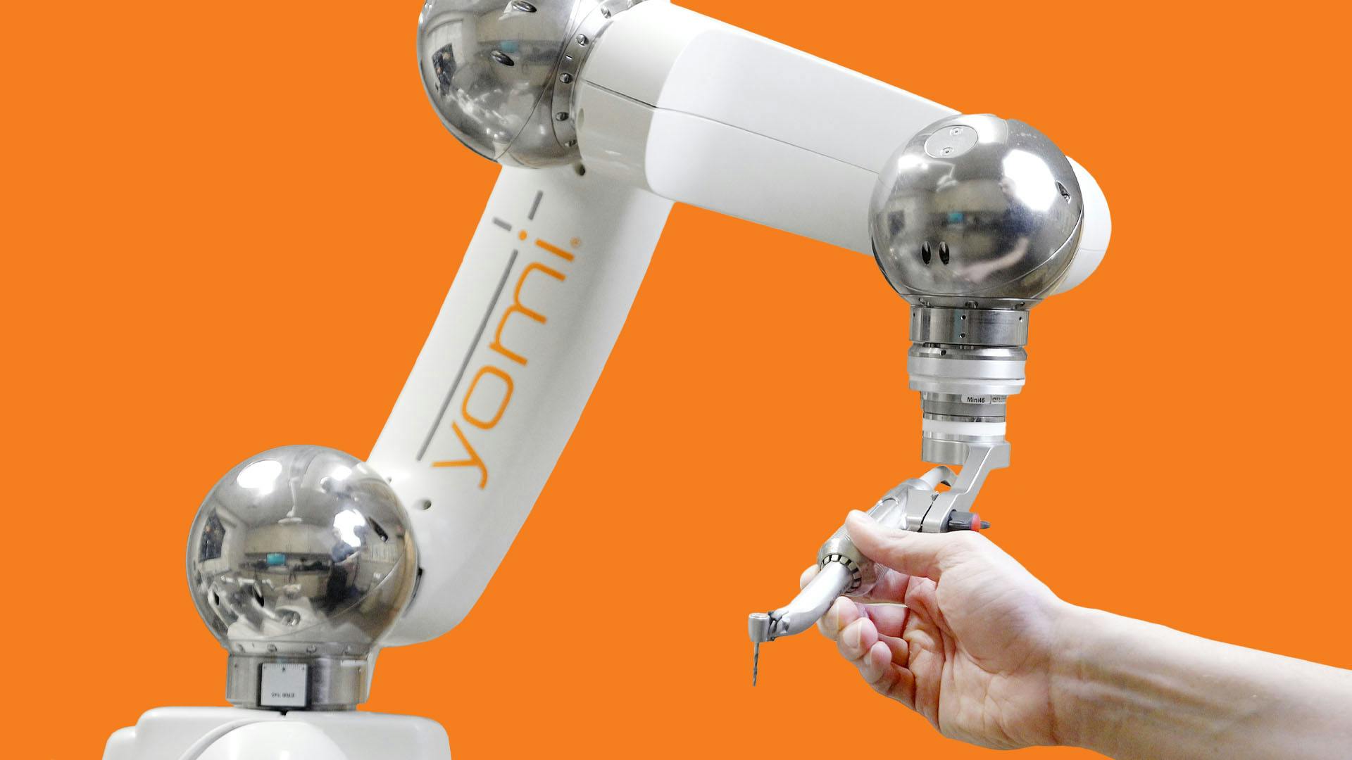 Yomi robot with human hand