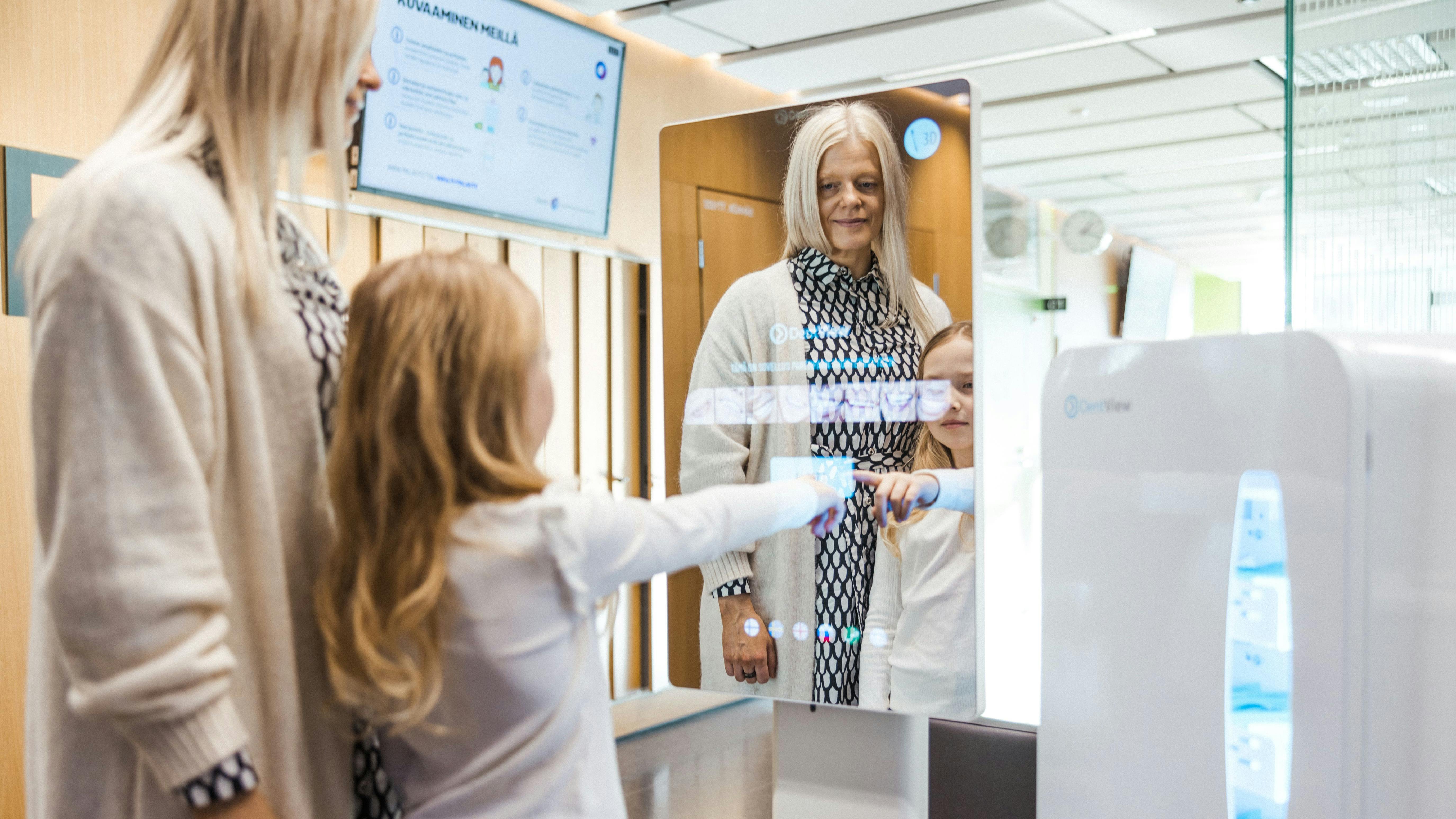 people in an oral-care kiosk