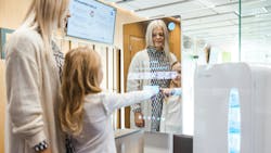 people in an oral-care kiosk people in an oral-care kiosk