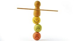 smiley faces and frowny faces balanced on top of each other smiley faces and frowny faces balanced on top of each other