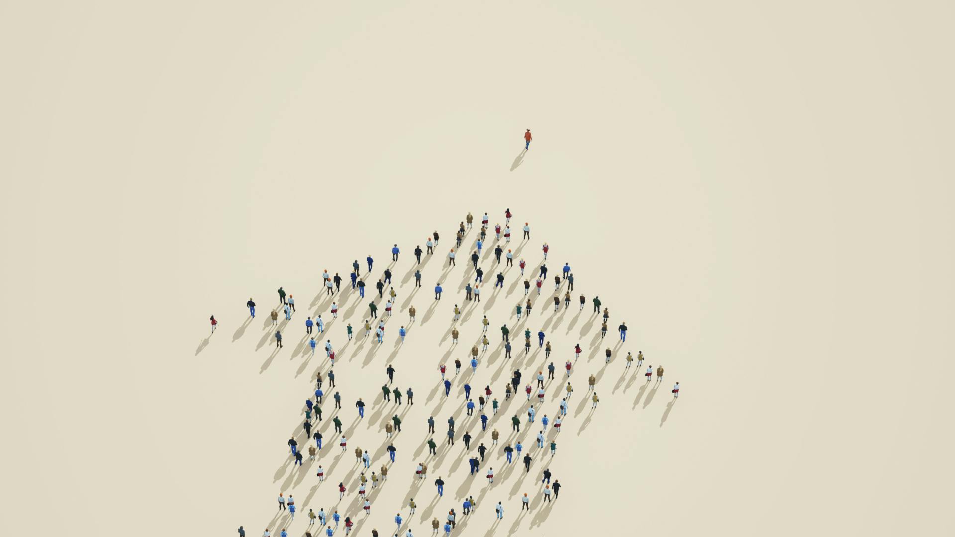 People standing in the shape of an arrow, following one person