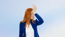 Woman with palm to forehead Woman with palm to forehead